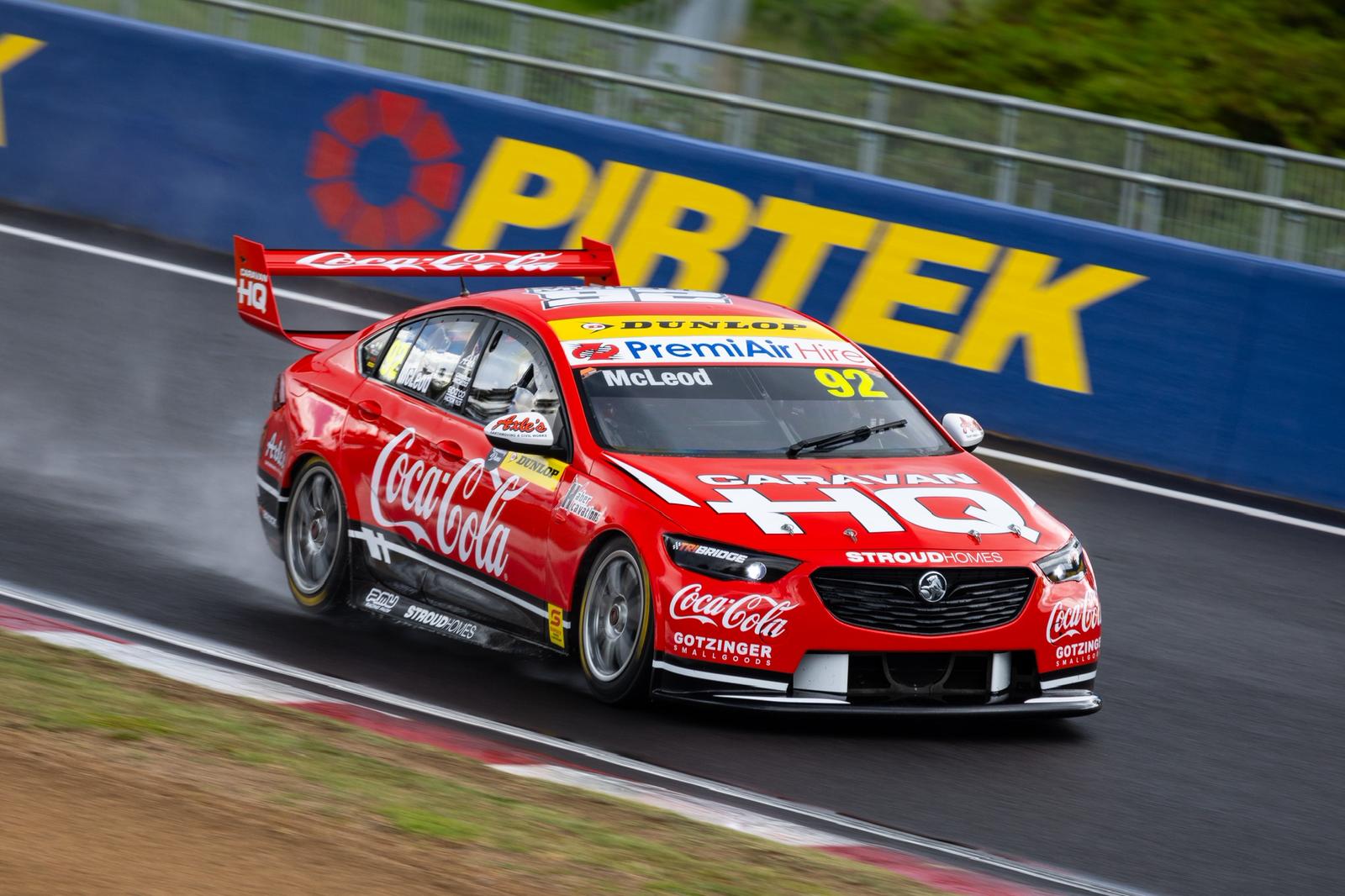 Motorsport race car with sponsor graphics and livery